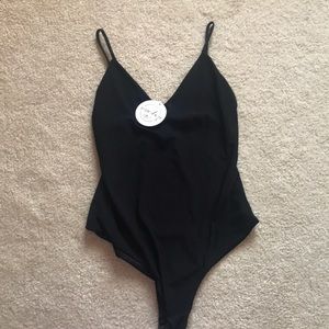 Black thong bodysuit!